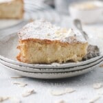SLice of lemon ricotta cake with almond flour on a plate