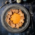 Overhead view of a whole chai spiced pumpkin pie