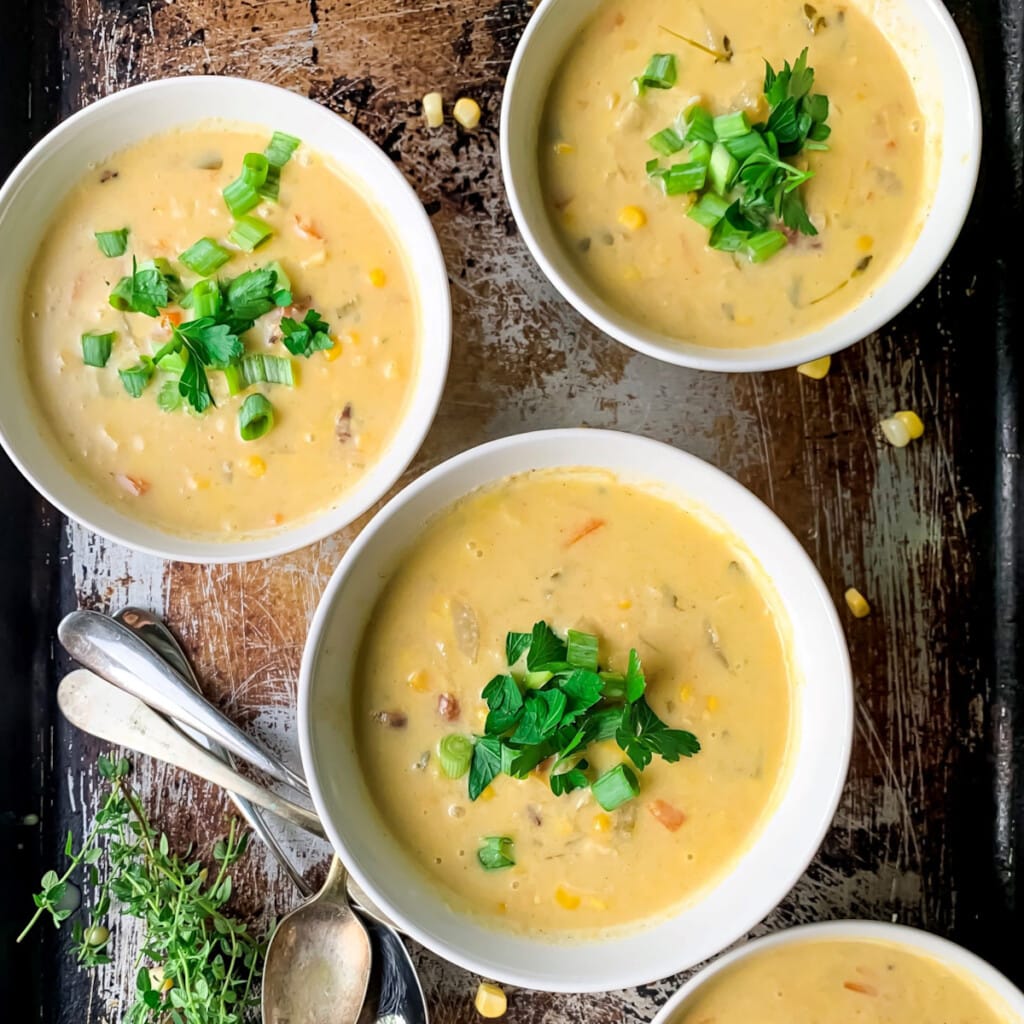 Bowls of homemade cummer corn chowder soup recipe.