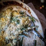 Close-up overhead view of homemade green bean casserole with a spoon