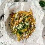 Overhead crispy greek fries with toppings.